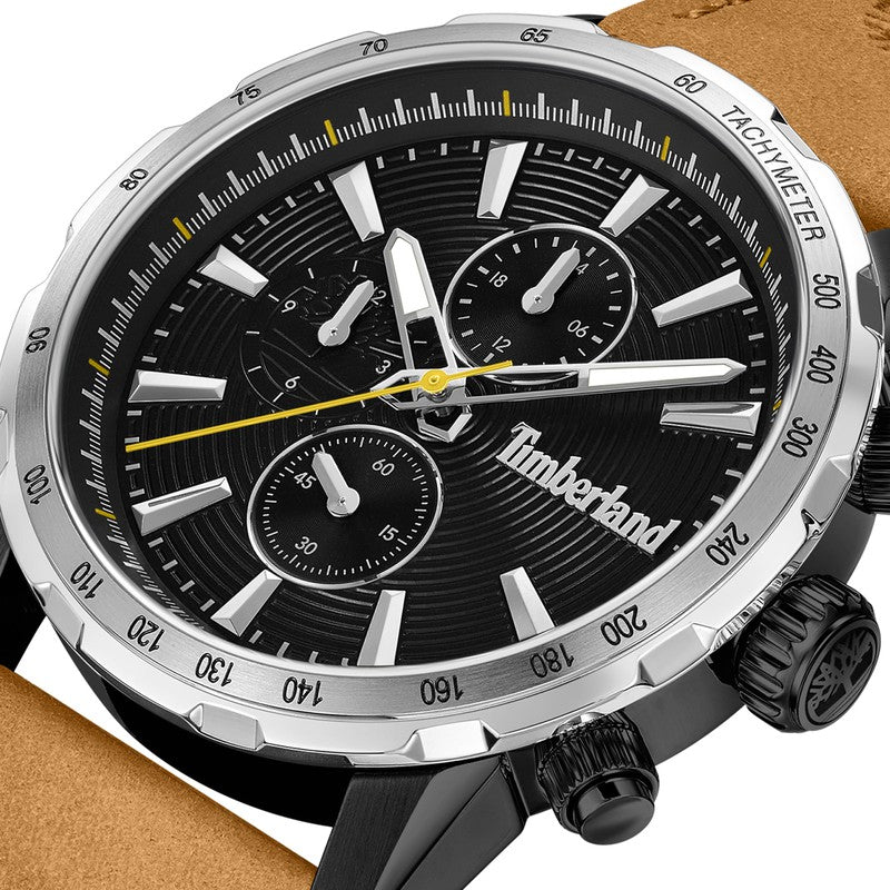 Timberland Kennebunk 46mm multifunction watch with a black dial, stainless steel case, and premium tan leather strap.
